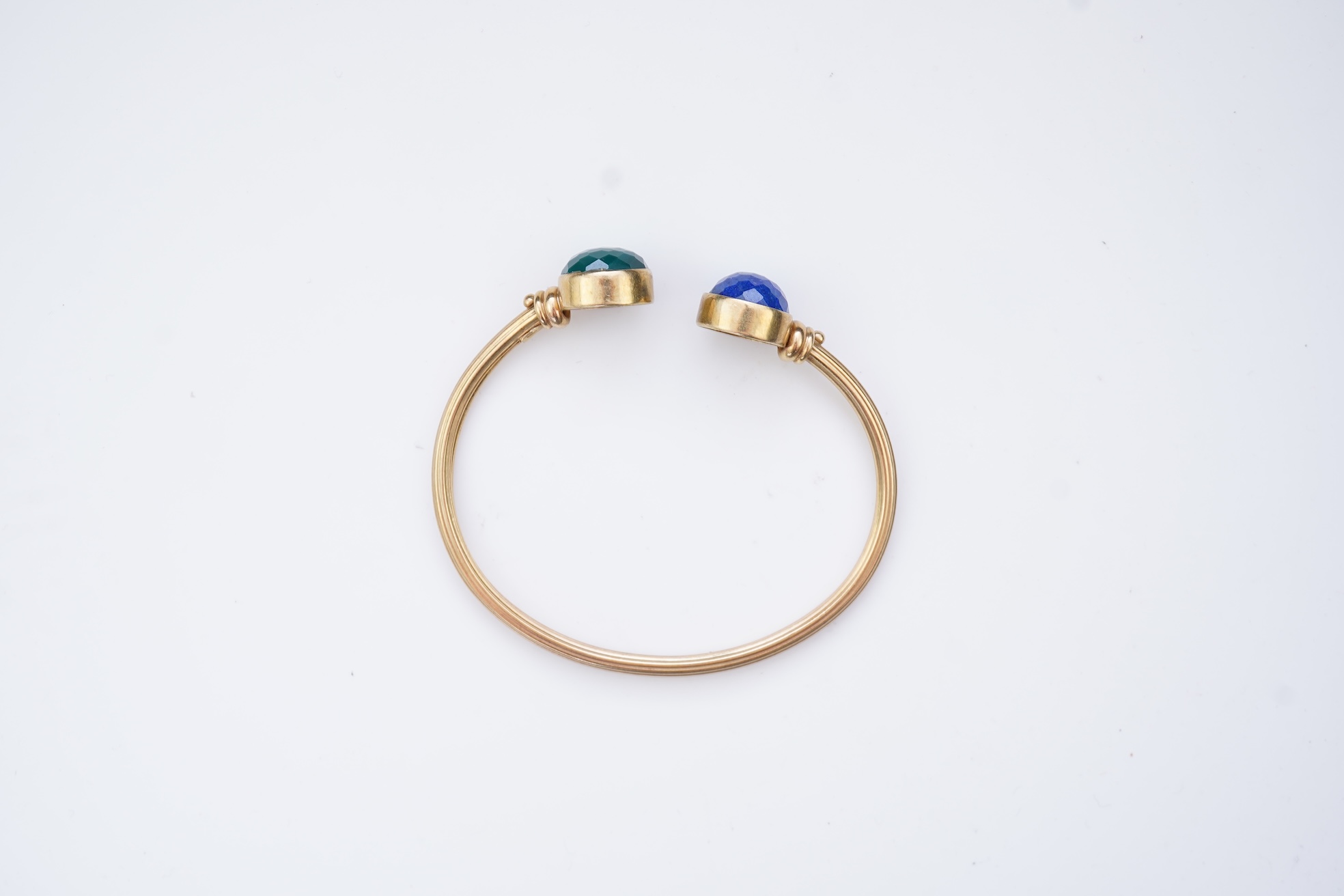 A gold, lapis lazuli and green chalcedony bangle